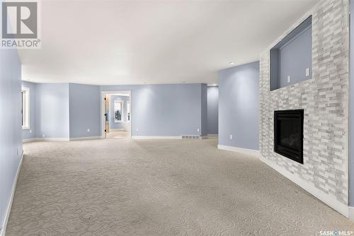 27 Federal Drive, White City, SK - Indoor With Fireplace