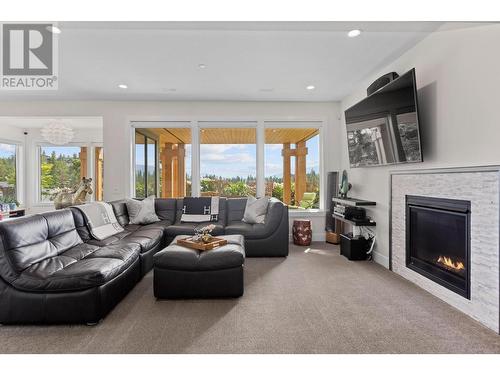 173 Whitetail Ridge, Vernon, BC - Indoor Photo Showing Living Room With Fireplace