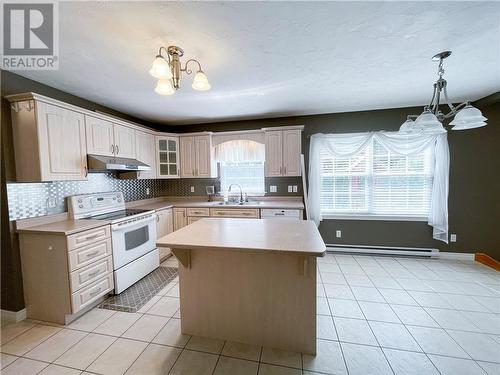 64 Mcandrew Street, Moncton, NB - Indoor Photo Showing Kitchen With Double Sink