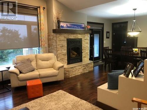 26 Pape Drive, Humboldt Lake, SK - Indoor Photo Showing Living Room With Fireplace