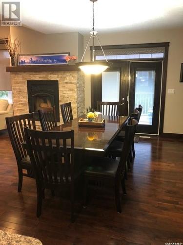 26 Pape Drive, Humboldt Lake, SK - Indoor Photo Showing Dining Room With Fireplace