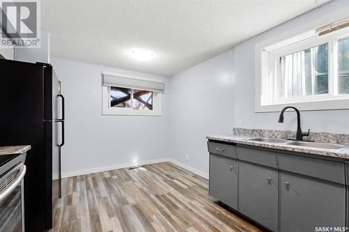 410 - 412 3Rd Street E, Delisle, SK - Indoor Photo Showing Kitchen With Double Sink