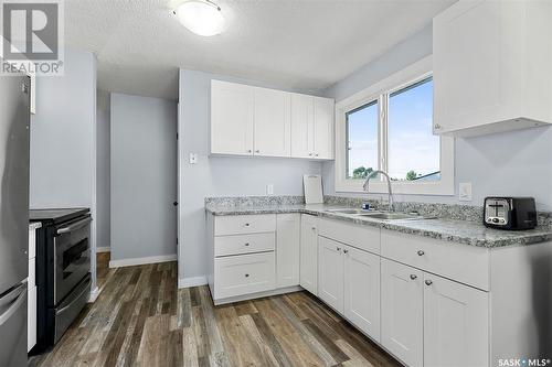 410 - 412 3Rd Street E, Delisle, SK - Indoor Photo Showing Kitchen With Double Sink