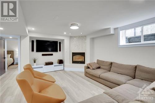 36 Cimarron Crescent, Ottawa, ON - Indoor Photo Showing Living Room With Fireplace