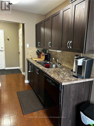 303 - 850 6Th Street E, Owen Sound, ON - Indoor Photo Showing Kitchen With Double Sink