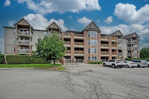 4003 Kilmer Drive Unit# 309, Burlington, ON - Outdoor With Balcony With Facade