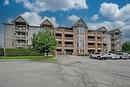 4003 Kilmer Drive Unit# 309, Burlington, ON  - Outdoor With Balcony With Facade 