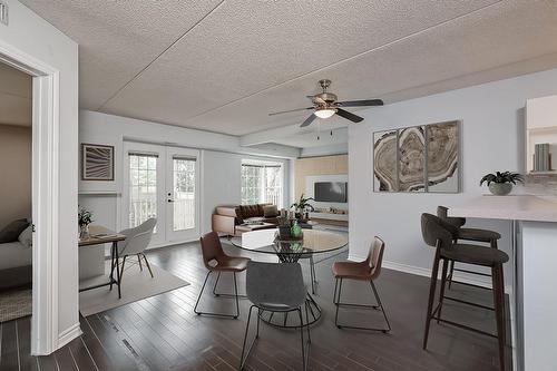 Virtually Staged - 4003 Kilmer Drive Unit# 309, Burlington, ON - Indoor Photo Showing Dining Room