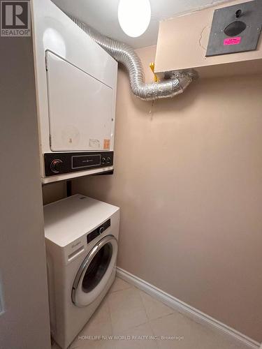 2006 - 77 Harbour Square, Toronto (Waterfront Communities), ON - Indoor Photo Showing Laundry Room