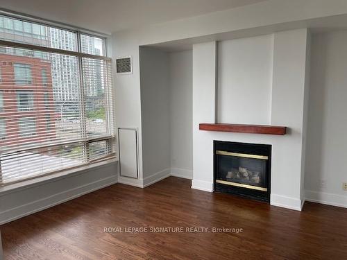 807E-500 Queens Quay W, Toronto, ON - Indoor Photo Showing Living Room With Fireplace