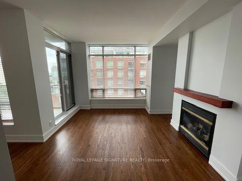 807E-500 Queens Quay W, Toronto, ON - Indoor Photo Showing Living Room With Fireplace