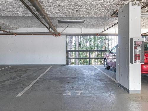 103-1145 Sikorsky Rd, Langford, BC - Indoor Photo Showing Garage