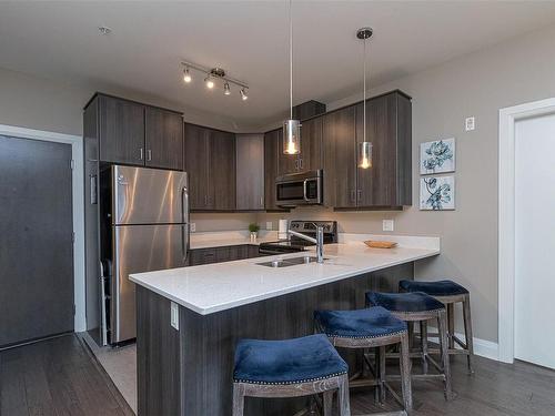 103-1145 Sikorsky Rd, Langford, BC - Indoor Photo Showing Kitchen With Stainless Steel Kitchen