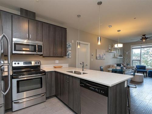 103-1145 Sikorsky Rd, Langford, BC - Indoor Photo Showing Kitchen With Stainless Steel Kitchen With Double Sink With Upgraded Kitchen