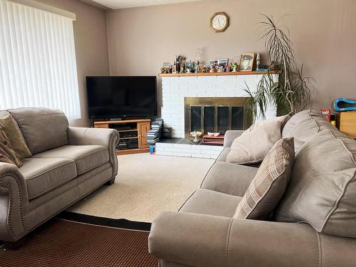 2199 Castillou Cres, Merritt, BC - Indoor Photo Showing Living Room With Fireplace