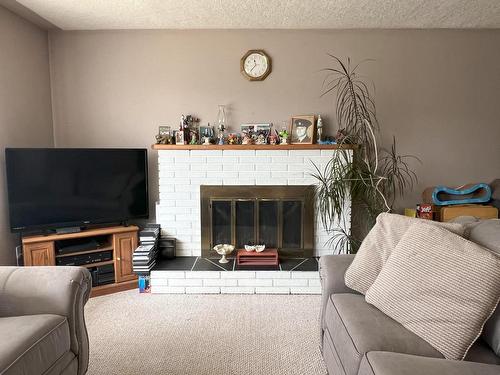 2199 Castillou Cres, Merritt, BC - Indoor Photo Showing Living Room With Fireplace