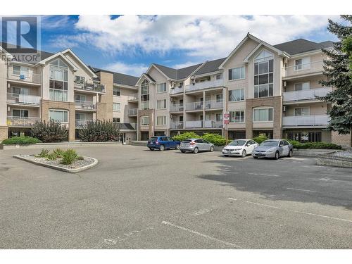 400 Sutton Crescent Unit# 103, Kelowna, BC - Outdoor With Balcony With Facade