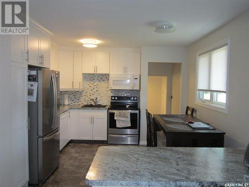 1107 Centre Street, Nipawin, SK - Indoor Photo Showing Kitchen With Double Sink