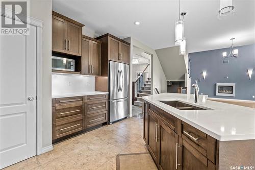 65 602 Cartwright Street, Saskatoon, SK - Indoor Photo Showing Kitchen With Double Sink With Upgraded Kitchen