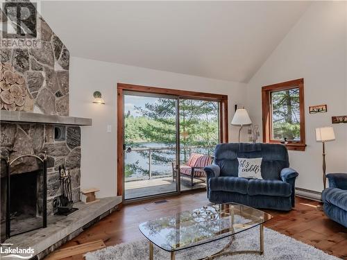 1071 Sunny Lake Road Unit# Unit 1, Gravenhurst, ON - Indoor Photo Showing Living Room With Fireplace