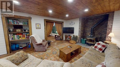 8061 265 Road, Fort St. John, BC - Indoor Photo Showing Living Room With Fireplace