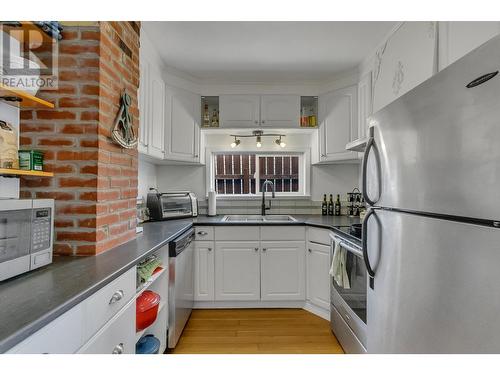 1643 8Th Avenue, Prince George, BC - Indoor Photo Showing Kitchen With Double Sink