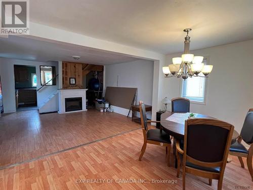 161 Middleton Avenue, Timmins (Timmins South - East), ON - Indoor Photo Showing Dining Room With Fireplace