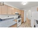 769 Klo Road Unit# 413, Kelowna, BC  - Indoor Photo Showing Kitchen With Double Sink 