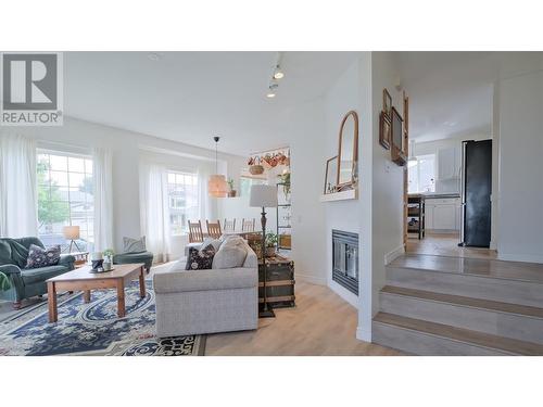 1875 Aitkins Court, Kelowna, BC - Indoor Photo Showing Living Room With Fireplace