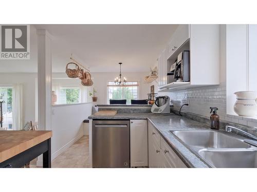 1875 Aitkins Court, Kelowna, BC - Indoor Photo Showing Kitchen With Double Sink