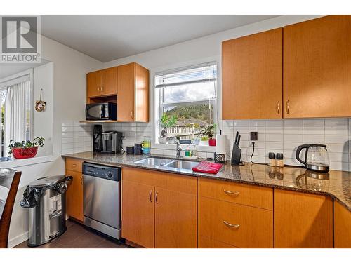 571 Yates Road Unit# 107, Kelowna, BC - Indoor Photo Showing Kitchen With Double Sink