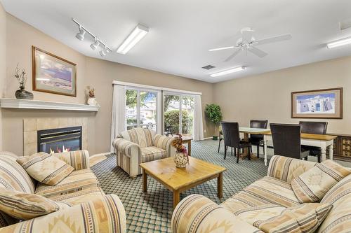 6-1120 Guisachan Road, Kelowna, BC - Indoor Photo Showing Living Room With Fireplace