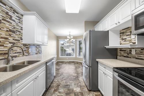 6-1120 Guisachan Road, Kelowna, BC - Indoor Photo Showing Kitchen With Double Sink