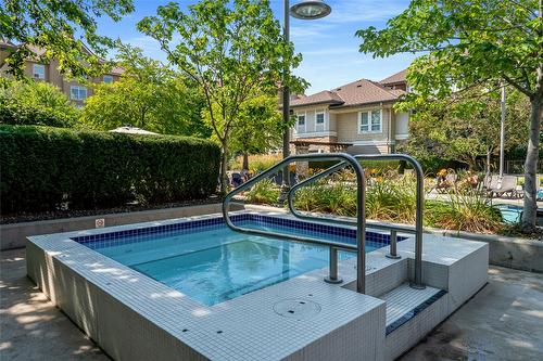 109-1089 Sunset Drive, Kelowna, BC - Outdoor With In Ground Pool With Backyard