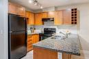 109-1089 Sunset Drive, Kelowna, BC  - Indoor Photo Showing Kitchen With Double Sink 