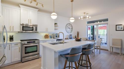 2102-4042 Pritchard Drive, West Kelowna, BC - Indoor Photo Showing Kitchen With Stainless Steel Kitchen With Double Sink With Upgraded Kitchen