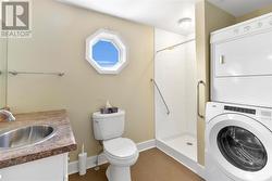 Main level 3 piece bath with Laundry - 