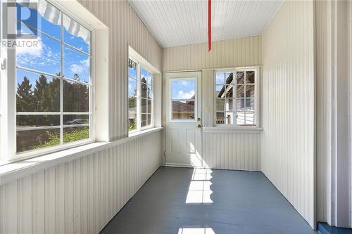 Sunroom with street access and side deck access - 22 James Street E, Brockville, ON - Indoor Photo Showing Other Room