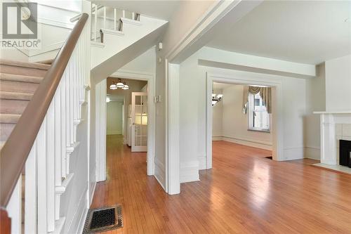 Front Foyer - 22 James Street E, Brockville, ON - Indoor With Fireplace