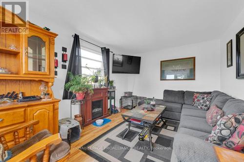 77 - 25 Tracey Park Drive, Belleville, ON - Indoor Photo Showing Living Room With Fireplace