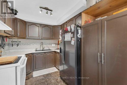 77 - 25 Tracey Park Drive, Belleville, ON - Indoor Photo Showing Kitchen With Double Sink