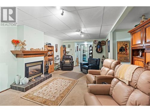 5620 South Vernon Bay, Vernon, BC - Indoor Photo Showing Living Room With Fireplace