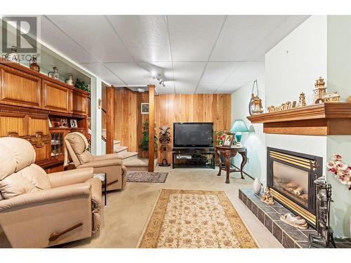 5620 South Vernon Bay, Vernon, BC - Indoor Photo Showing Living Room With Fireplace