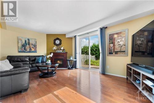 Large and bright living room with gleaming hardwood floors. - 17 Sovereign Avenue, Ottawa, ON - Indoor Photo Showing Living Room