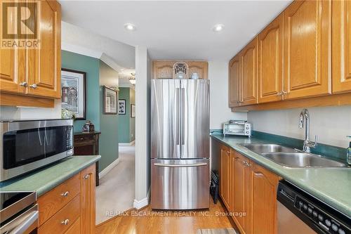 1601 - 26 Hanover Road, Brampton, ON - Indoor Photo Showing Kitchen With Double Sink