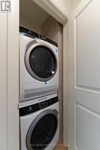 506 - 11 Robert Street, Hamilton (Beasley), ON - Indoor Photo Showing Laundry Room