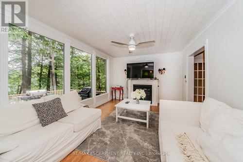 6 Darling Drive, Muskoka Lakes, ON - Indoor Photo Showing Living Room With Fireplace