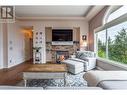 1011 Aurora Heights, West Kelowna, BC  - Indoor Photo Showing Living Room With Fireplace 