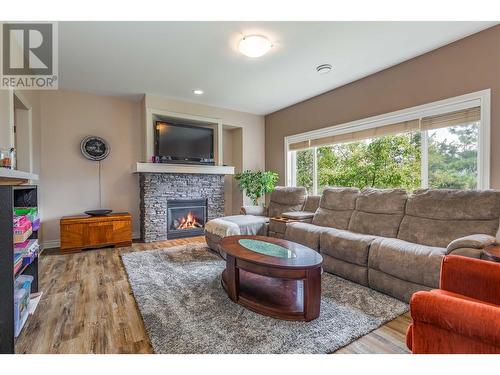 1011 Aurora Heights, West Kelowna, BC - Indoor Photo Showing Living Room With Fireplace