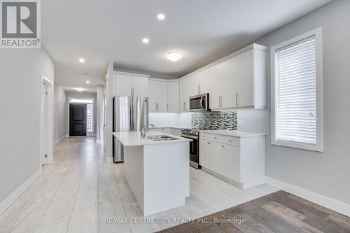 2284 Evans Boulevard, London, ON - Indoor Photo Showing Kitchen With Double Sink With Upgraded Kitchen